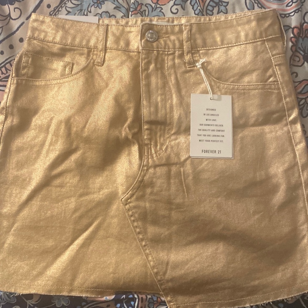 Small rose gold skirt.